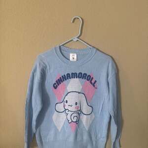 Sanrio Women's Cinnamoroll Light Blue Argyle Graphic Knit Sweater